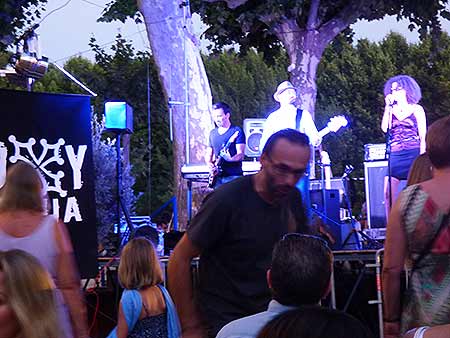 Band playing at festival outside Cafe de la Promenade, Bize Minervois